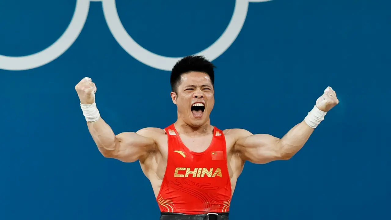 El chino Fabin Li revalid&oacute; el oro en los 61 kg de halterofilia. EFE/EPA/RITCHIE B. TONGO